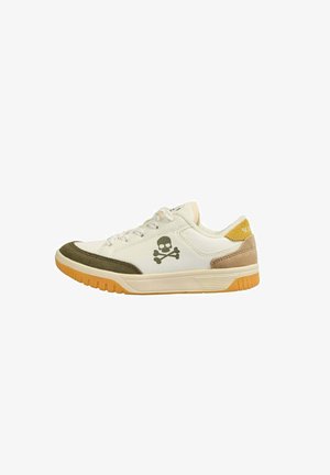 White sneaker with green and tan suede accents. Features a skull and crossbones logo on the side. Rubber sole, round toe, and lace-up design.