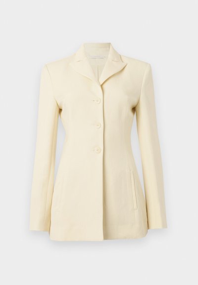 Cream-colored blazer featuring a notched collar, single-breasted design, and three buttons; includes side pockets and structured fit.
