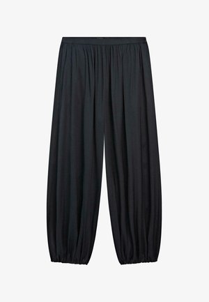 Volné černé kalhoty s elastickým pasem a stahovacími elastickými manžetami, vyrobené z lehké látky.