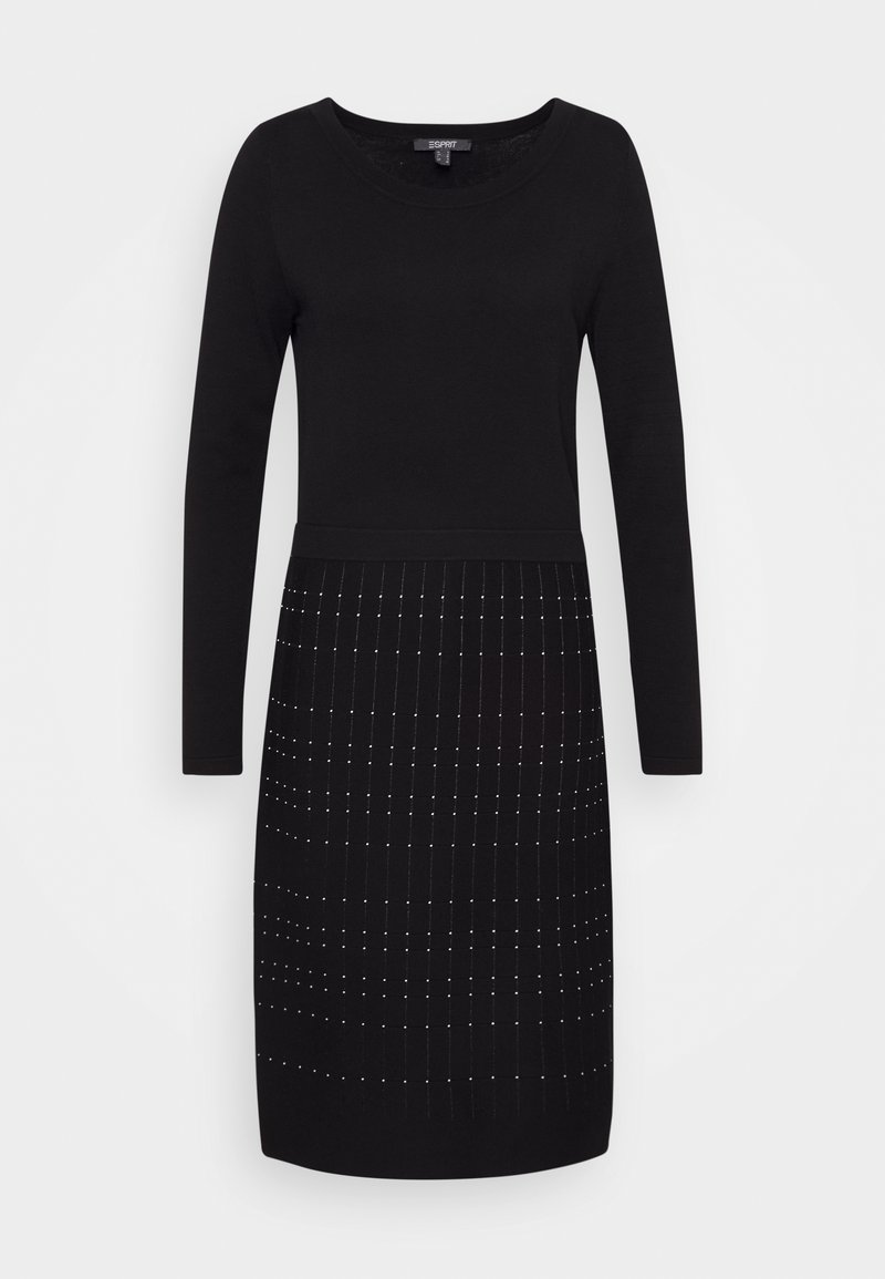 Robe noire à manches longues, longueur genou, taille cintrée et motif subtil de pois verticaux sur la partie jupe.