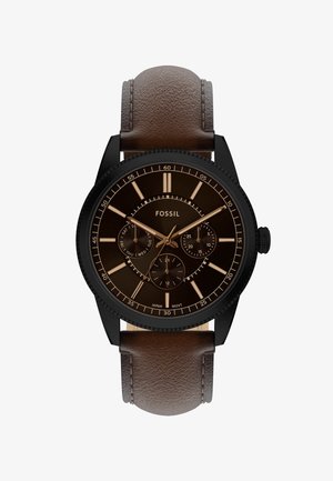 Fossil chronograph watch with a black stainless steel case, dark brown leather strap, and a brown dial featuring gold-tone markers and subdials.