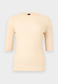 Ριμπ ύφασμα, κοντομάνικη μπλούζα σε ανοιχτό μπεζ χρώμα. Κατασκευασμένη από μαλακό υλικό με εφαρμοστή γραμμή. Απλός στρογγυλός λαιμός και λεία υφή.