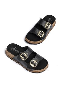 Schwarze Leder-Sandalen mit zwei verstellbaren Riemen und goldenen Schnallen, Korkfußbett und strukturiertem Obermaterial. Weiche Innenauskleidung für mehr Komfort.