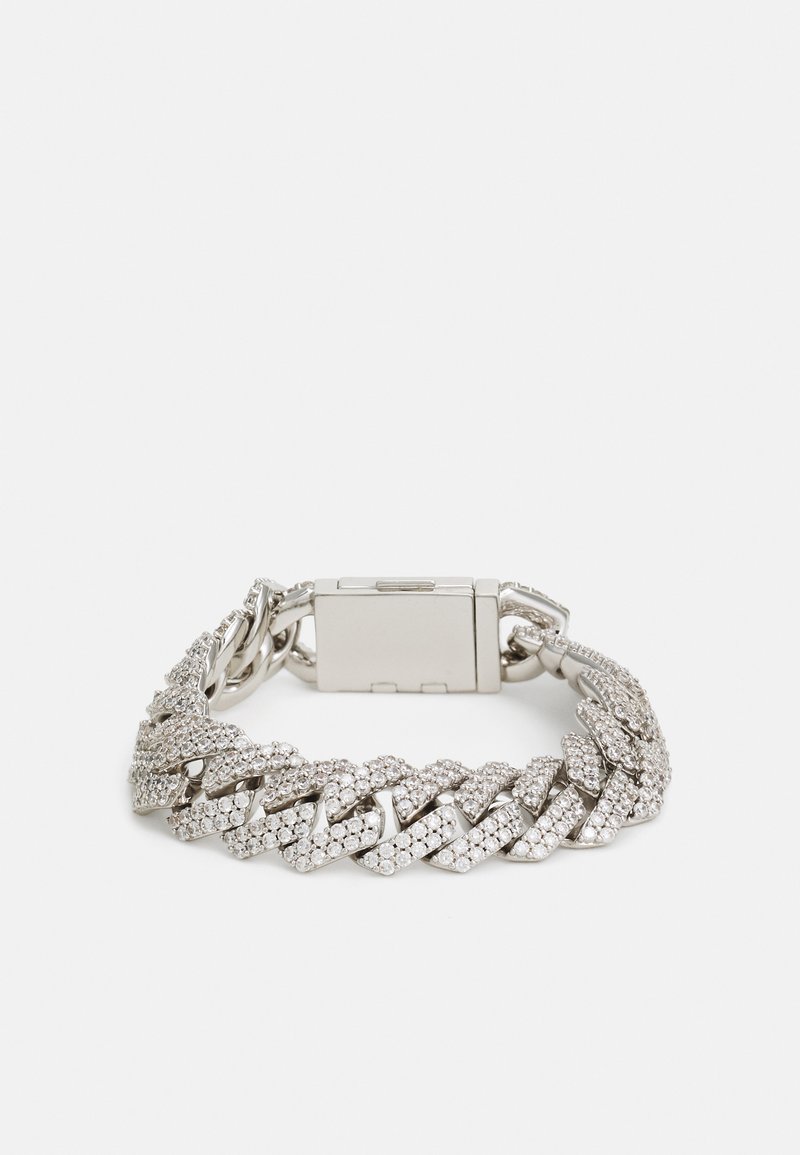 Silver chain bracelet with a twisted design, accented with clear rhinestones, featuring a clasp closure. Smooth finish and textured links.
