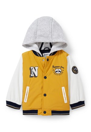 Välikausitakki - yellow