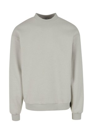 Světle šedá mikina s vysokým límcem, dlouhými rukávy a ribbanými manžetami a lemem. Vyrobena z měkké, texturované tkaniny.