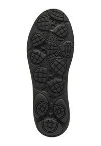 Semelle de chaussure en caoutchouc noir avec une surface texturée comportant des motifs circulaires et en grille, des trous de ventilation, et un bord étiqueté pour une meilleure adhérence.