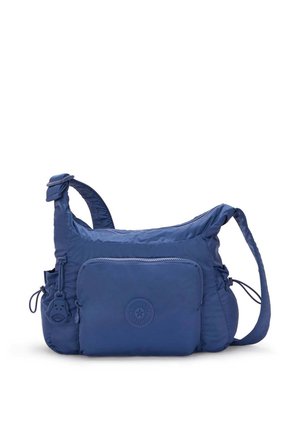 Navyblauwe nylon schoudertas met een gestructureerde afwerking, voorzien van een voorvak, verstelbare riem en een sleutelhangeraantal met een apenontwerp.