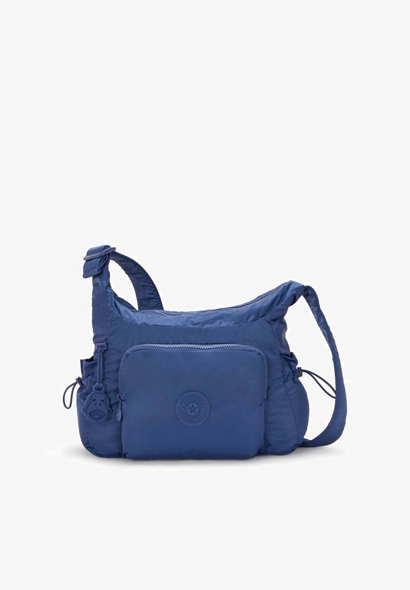 Navyblauwe nylon schoudertas met een gestructureerde afwerking, voorzien van een voorvak, verstelbare riem en een sleutelhangeraantal met een apenontwerp.