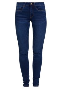 Slimmad jeans i mörkblå denim med en slät struktur, standarddesign med fem fickor och kontrastsömmar längs sömmarna.