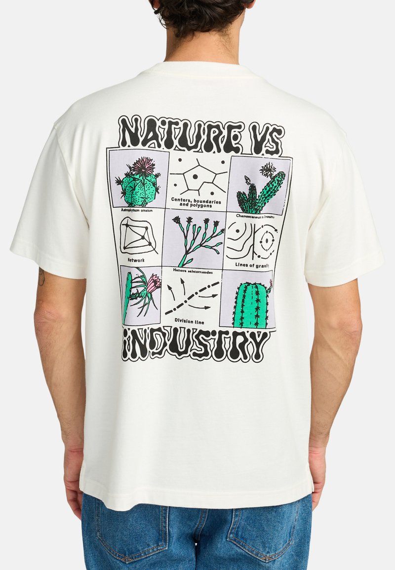 Cream short-sleeve t-shirt featuring a graphic print on the back with cacti, diagrams, and text "NATURE VS INDUSTRY" in black.