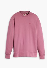 Rosa sweatshirt med rund hals, lång ärm och ribbade mudd. Har en liten röd logotyp på bröstet. Slät tygstruktur.