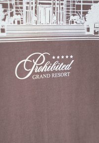 Gray fabric featuring a white print of a building outline with "Prohibited Grand Resort" text and five stars below it. Smooth texture.