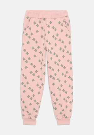 Vaatekappaleet: Vaaleanpunaiset lasten collegehousut, joissa on vihreita kaktuskuvioita, joustava vyötärö, sivutaskut ja ribatut hihnat nilkoissa.