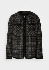 Mustvalge tweed jope ümarate kraede ja kahe eesmise taskuga, millel on tekstuuriga ruuduline muster. Avatud ees oleva disainiga ja pikad varrukad.