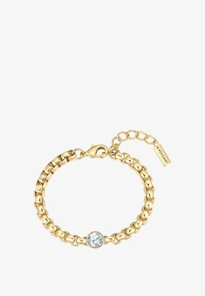 Kuldketiga käevõru, mille keskmes on sinine kalliskivi, varustatud lõppkinnitusega ja reguleeritava lingiga suuruse kohandamiseks.