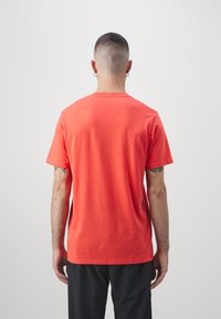 adidas Performance TR-ES FR T - Sportfelső - bright red/black