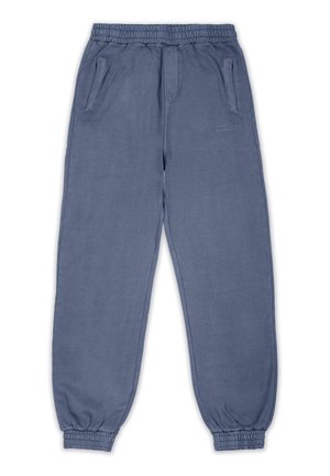 Blå joggebukser laget av mykt stoff, med elastisk midje, to side lommer og tettsittende mansjetter ved anklene.