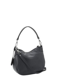 Sac à main en cuir noir avec une surface texturée, une forme arrondie, une petite anse en haut et une bandoulière amovible. Équipé d'une fermeture éclair et d'une étiquette en cuir.