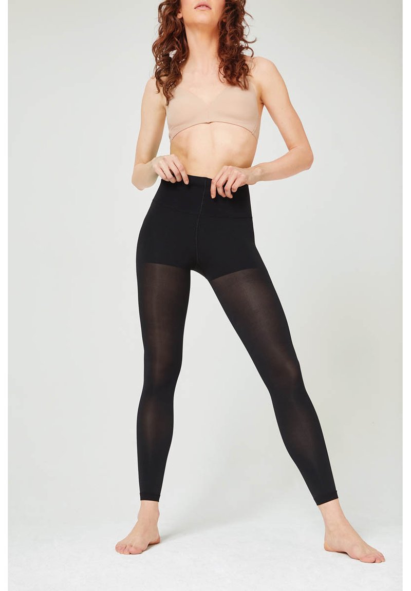 Schwarze Leggings mit einem hohen Bund, gefertigt aus einem glatten, dehnbarem Material. Durchsichtige Einsätze sorgen für eine elegante, figurbetonte Silhouette.