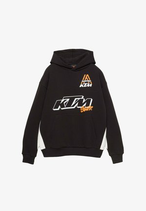 Felpa nera in misto cotone con tasca frontale, cappuccio con cordino e dettagli bianchi. Presenta i loghi KTM arancioni e bianchi.