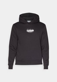 Felpa nera con cappuccio realizzata in morbido tessuto, dotata di tasca a marsupio frontale, polsini a coste e logo "Calvin Klein" stampato in bianco.