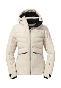 Giubbotto imbottito di un beige chiaro, con chiusura a zip sul davanti, cappuccio regolabile, dettagli neri e tasche con zip; texture liscia con motivo trapuntato.