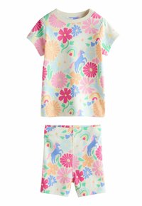 Ensemble composé d'un haut à manches courtes et d'un short avec des motifs colorés de fleurs, arc-en-ciel, cœurs et licorne bleue sur fond blanc.