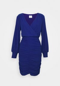 Lila klänning med en omslagdesign, lång puffärm, draperad textur och en figurnära silhuett. Tillverkad av ett mjukt, stretchigt tyg.