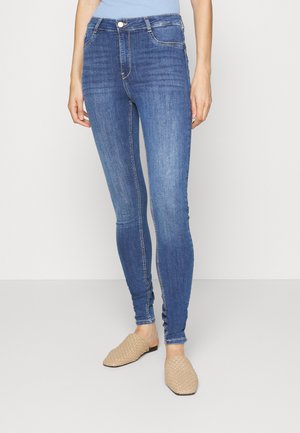 JDYVEGA HIGH PUSH UP - Calças de ganga de corte skinny - dark blue denim
