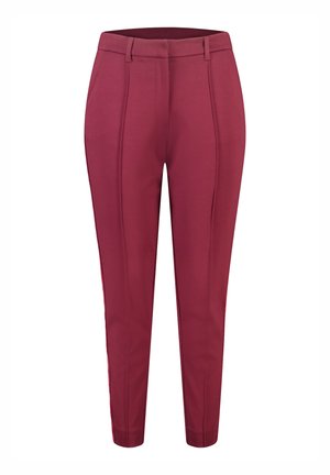 Pantalons ajustés bordeaux en tissu lisse avec des rayures latérales. Équipés d'une taille avec passants de ceinture et d'un design slim.