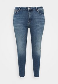 Blå slim-fit denimjeans med knapp- och dragkedjestängning, fram- och bakfickor samt subtilt urtvättade detaljer på benen.