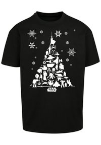 Melna T-kreklu ar baltu grafiku, kurā attēlots Ziemassvētku koks, kuru veido Star Wars varoņi, apkārt sniega pārslas un teksts "Star Wars" apakšā.