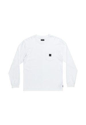 Dlhý rukáv biele tričko vyrobené z bavlny, s náprsného vreckom a čiernou logom nášivkou a elastickými manžetami. Klasický okrúhly výstrih.