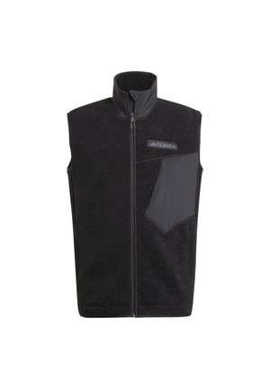 Black fleece vest with high collar, front zipper, and left chest pocket in contrasting fabric. Features plush texture and minimal branding.