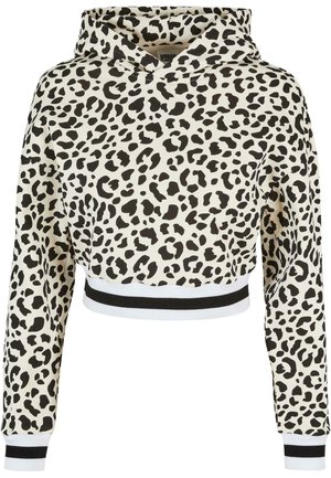 Krótka bluza z kapturem w czarno-biały wzór lamparta, długie rękawy oraz ściągacze i dół z prążkowanej tkaniny w czarno-białe paski.