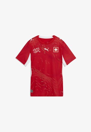 Rdeč nogometni dres iz zračne tkanine z valovitim vzorcem, belimi poudarki, emblemom švicarske zastave in logotipom Pume na prsih.