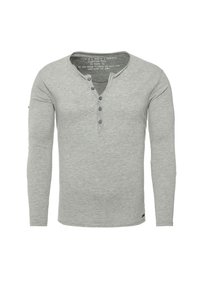 Graues Langarm-Henley-Shirt aus weichem Stoff mit Knopfleiste und dezenter Textur. Größe angegeben als M.