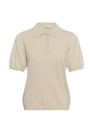 Polo de manga corta color crema con patrón de puntos texturizados, tres botones delanteros y cuello clásico.