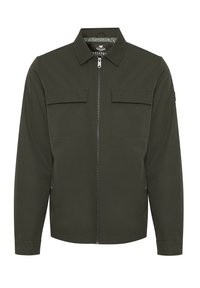 Veste vert foncé, avec une fermeture éclair à l'avant, un col pointu et deux poches poitrine. Présente une texture lisse et une doublure subtilement imprimée.