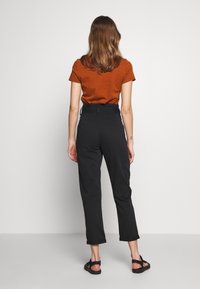 Topshop Tygbyxor - black