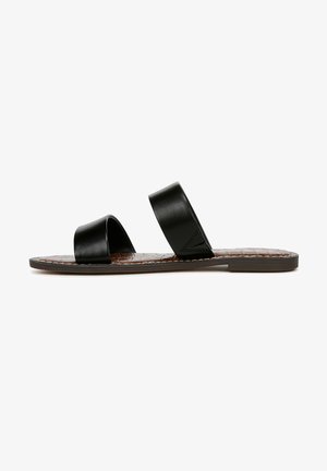 Black leather slide sandal with two wide straps, flat sole, and textured brown insole. Simple design with no visible hardware.