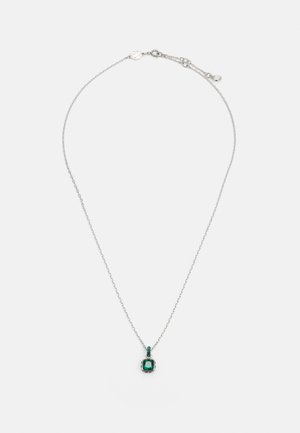 Silver chain necklace featuring a square green gemstone pendant with a glossy finish and small accent stones above the centerpiece.