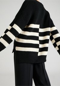 Guido Maria Kretschmer Collection Stickad tröja - black