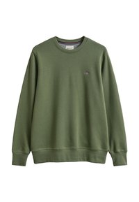Sweat-shirt col rond vert olive avec manches longues et petit logo brodé en forme de bouclier sur la poitrine gauche.