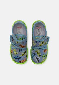 Blue fabric shoes with multicolored dinosaur patterns, green accents, and adjustable velcro straps. Soft cotton lining.