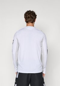 Cotton On - Ryan - Top à manches longues et col boutonné - Gris