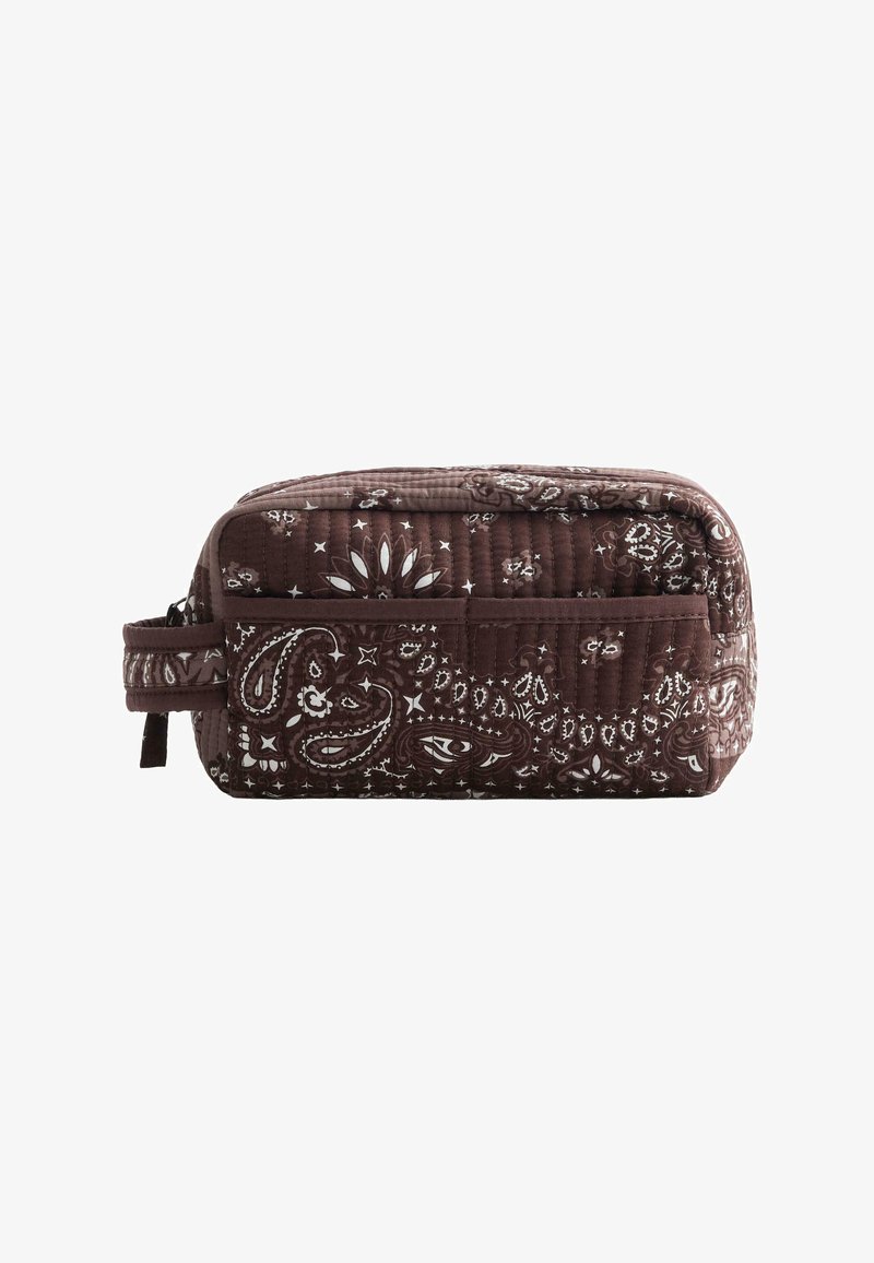 Quilted rectangular brown toiletry bag with paisley and floral white patterns and a side fabric handle.