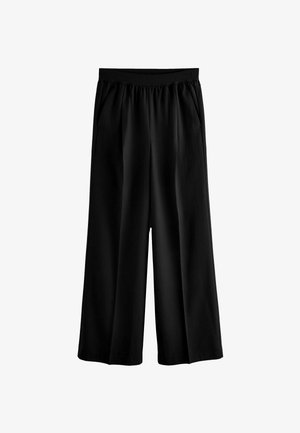 Črne široke hlače z elastičnim pasom, ki imajo dva stranska žepa in gladko, lahko tkanino.
