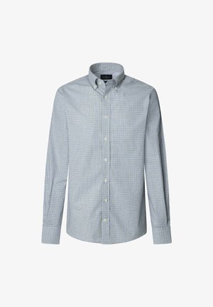 Camicia a bottoni in un motivo a scacchi blu e bianco. Maniche lunghe, colletto e orlo arrotondato. Tessuto di cotone con una superficie liscia.